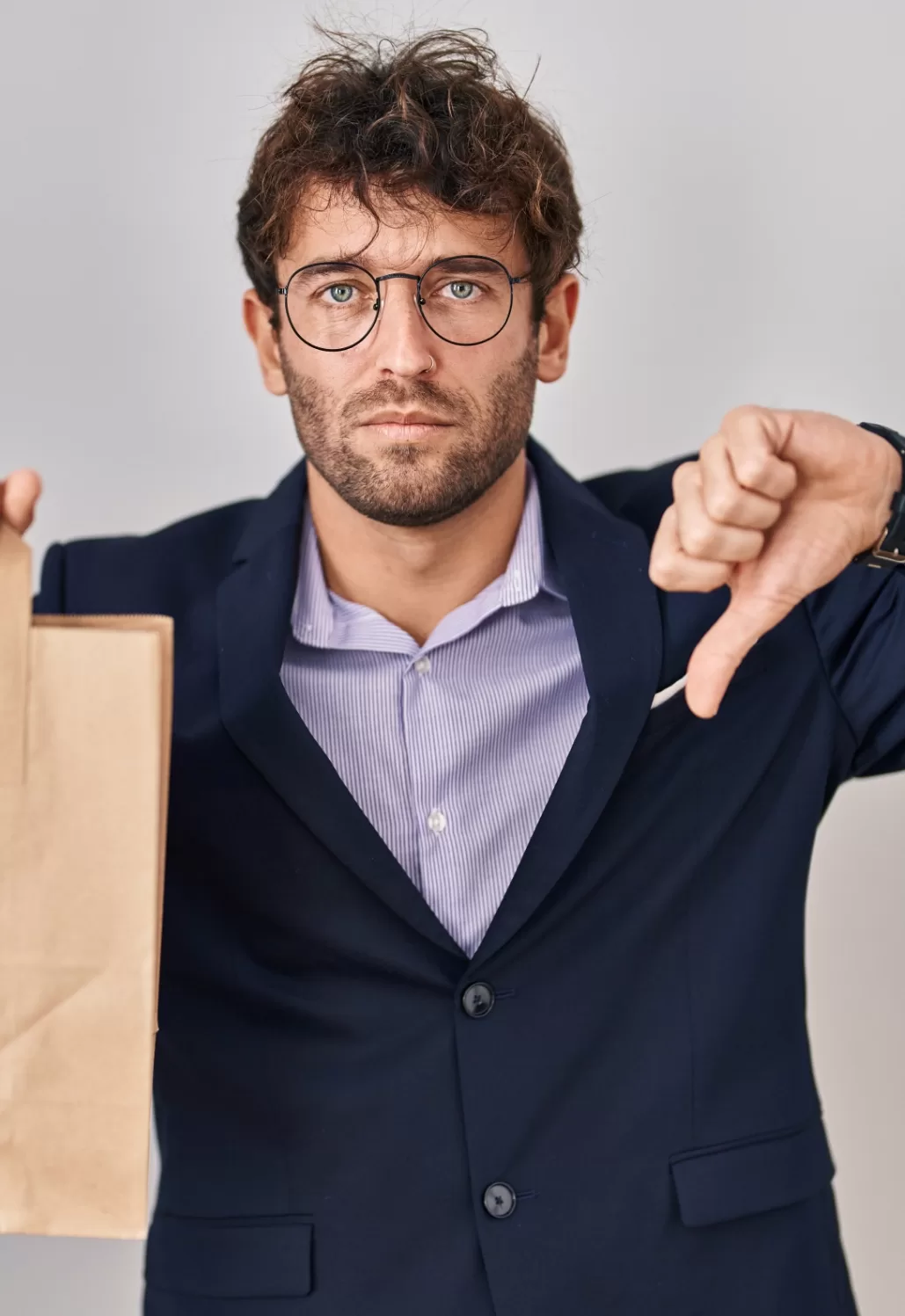 hispanic-business-man-holding-delivery-bag-with-angry-face-negative-sign-showing-dislike-with-thumbs-down-rejection-concept